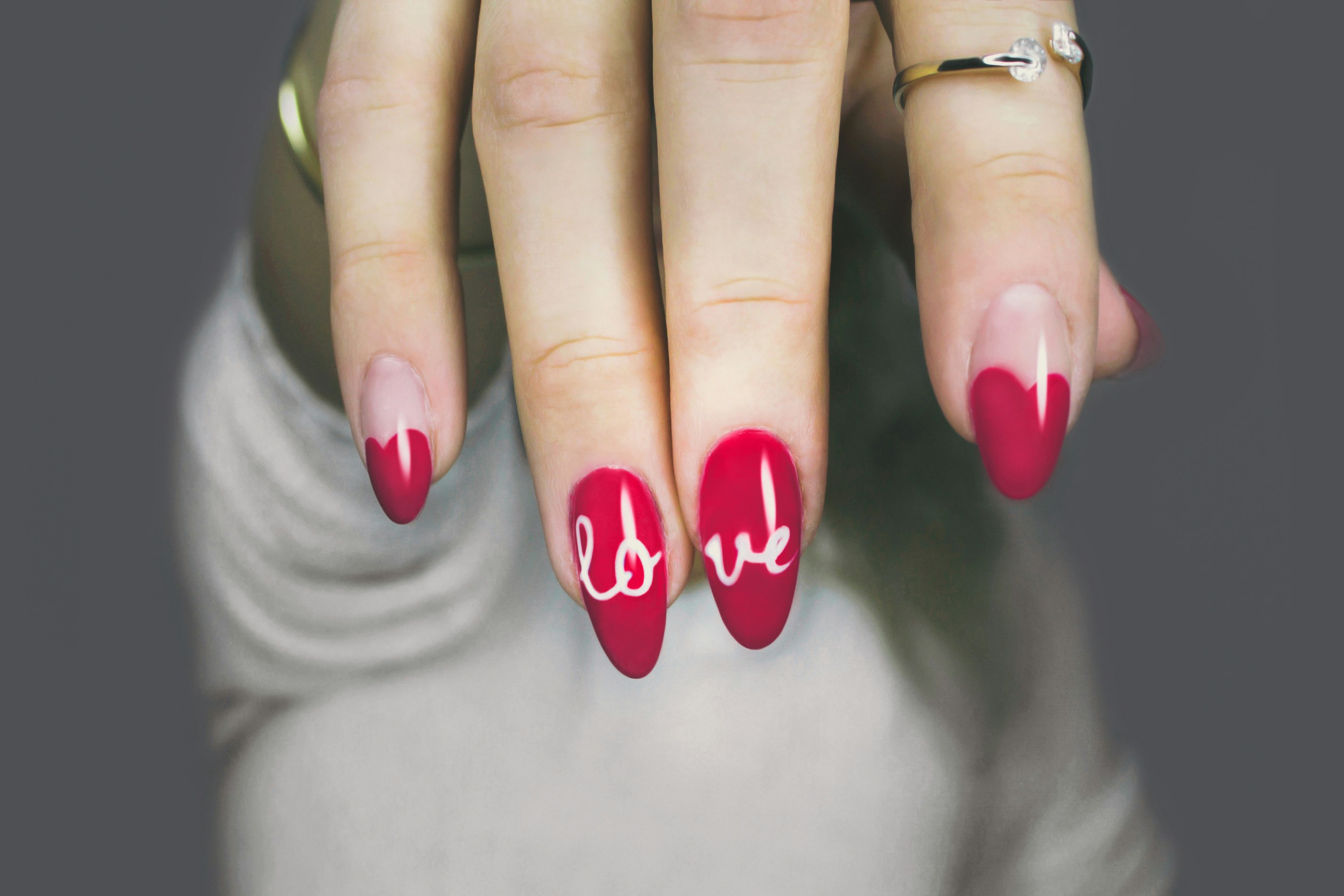Custom red nail art with hand-painted lettering — Luxe Nails Brooklyn